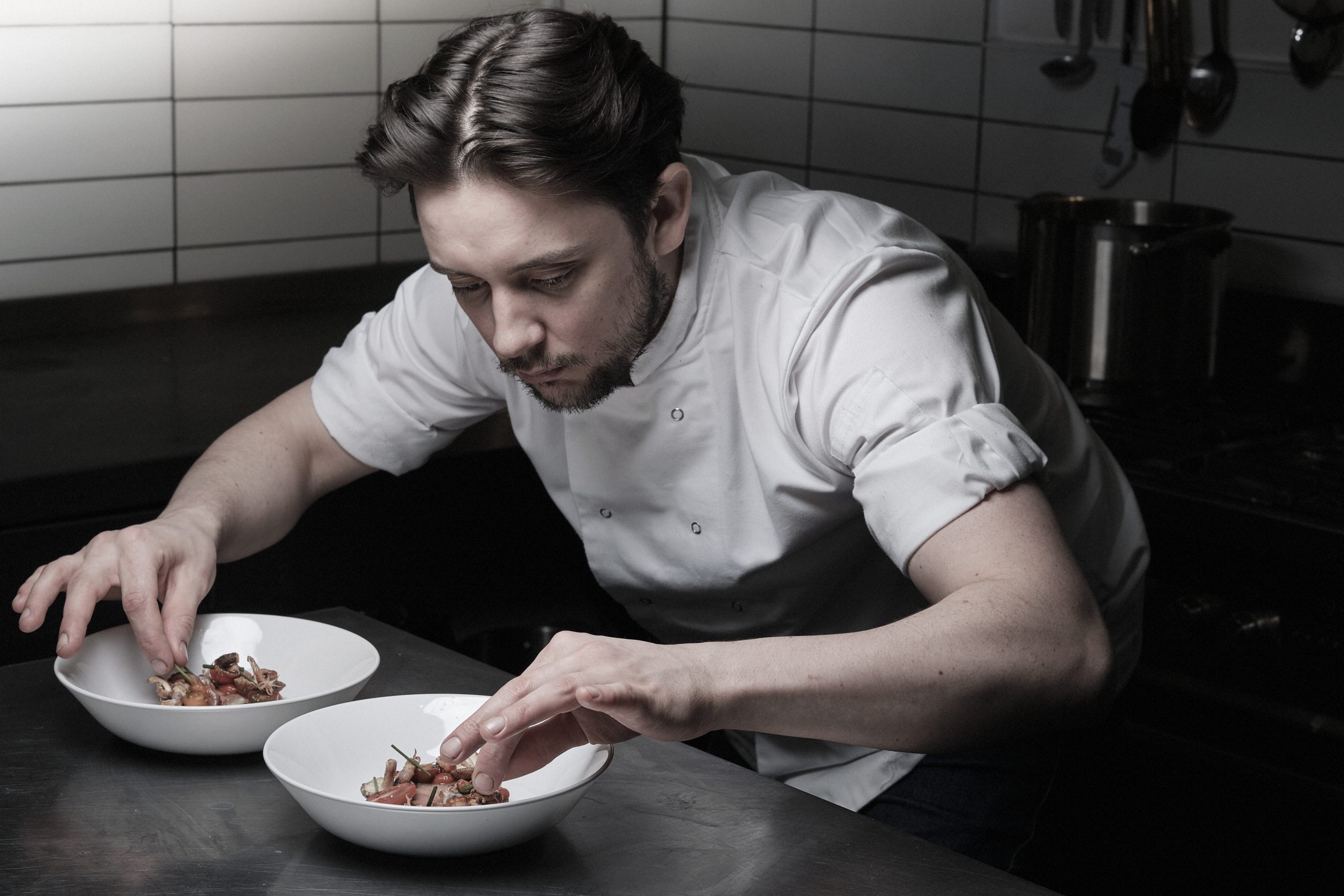 Chef Laurie preparing dishes